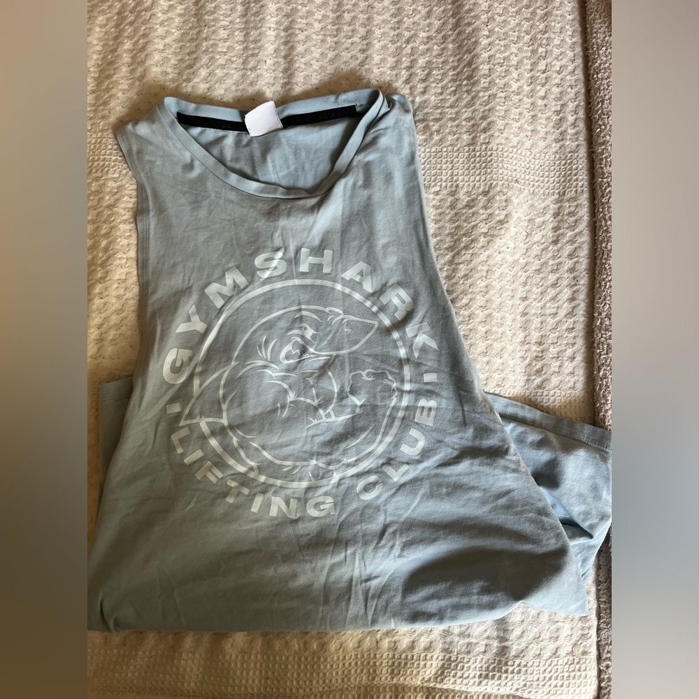 DELETING TMRW blue gymshark drop arm tank